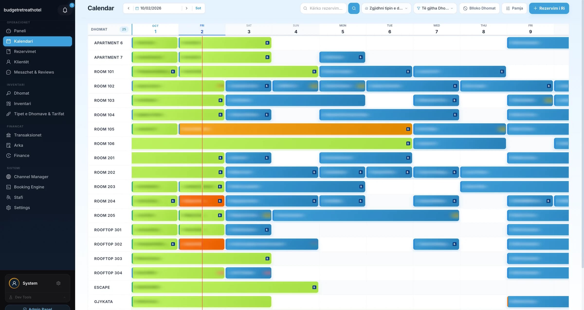 The LuxHotel reservation calendar with bookings coloured by payment status: paid in green, part paid in orange, upcoming in blue